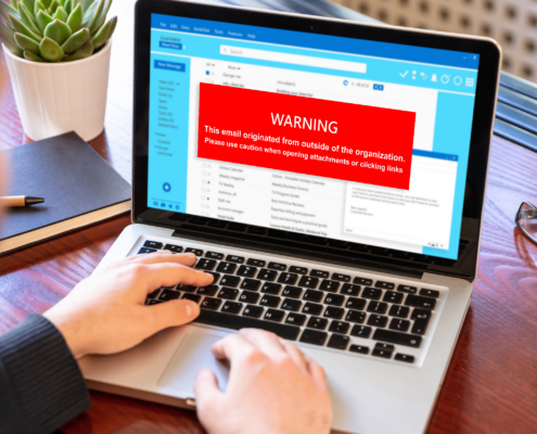 Image of a Computer with warning message on it.